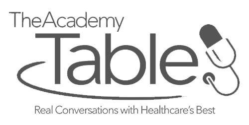 The Academy Table logo in black and white